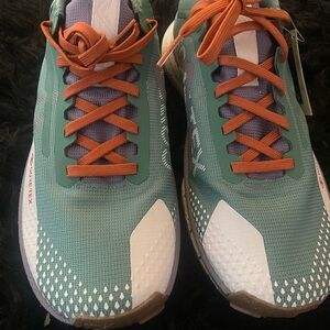 Nike Women's Athletic Shoes in Teal and White with Orange Accents